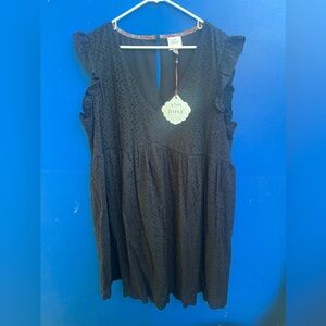 NWT. Women’s short sleeved mini dress with flutter sleeves. Size 1X.Fully lined.